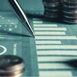 Pile of gold coins money stack in finance treasury deposit bank account saving . Concept of corporate business economy and financial growth by investment in valuable asset to gain cash revenue .