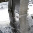 Galvanized parts. Galvanized industrial parts on a construction site. Galvanizing factory process. Galvanizing metal parts in galvanic workshop