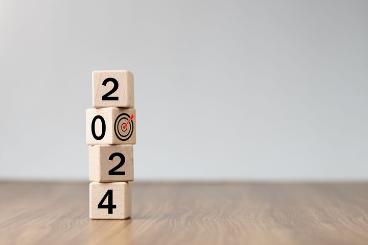 2024 Happy New year background banner. 2023 on wooden block cube for preparation new year change and start new business target strategy concept. Welcome, Merry Christmas.