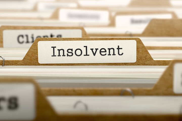 Insolvent Concept. Word on Folder Register of Card Index. Selective Focus.