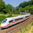 Amstetten, Germany - July 21, 2021: ICE 3 high-speed train of Deutsche Bahn on Geislinger Steige near Amstetten, Germany.
