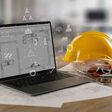 Engineer architect industry 4.0 using computer construction site, industrial and innovation infographic at building futuristic architect control innovation safety design