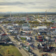 Ausstellungsbereich, Gel?nde, Cumuluspresseseitenasset, Freigel?nde, MUNICH 2022, bauma, outdoor area, Building, City, Cityscape, Construction, Outdoors, Road, Truck, Urban, Water, Waterfront