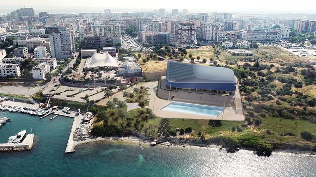 Der Entwurf ordnet die Schwimmhalle und das offene Becken unmittelbar am Ufer an. Das gesamte Sportzentrum umfasst rund 12.000 Quadratmeter Fläche.