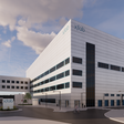 Die Visualisierung zeigt Fab4Micro am bestehenden X-FAB-Standort in Erfurt. PORR plant und errichtet den Neubau mit rund 3.500 Quadratmetern Reinraumproduktionsfläche sowie einem angeschlossenen Bürotrakt.