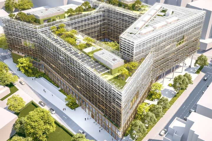 So soll das neue Landesdienstleistungszentrum in Salzburg aussehen: Das rund 50.000 Quadratmeter große Verwaltungsgebäude entsteht in Holz-Hybridbauweise und wird von der ARGE HABAU–SWIETELSKY errichtet. Die Visualisierung zeigt die markante Gebäudeform mit begrünten Dachflächen und Innenhöfen.