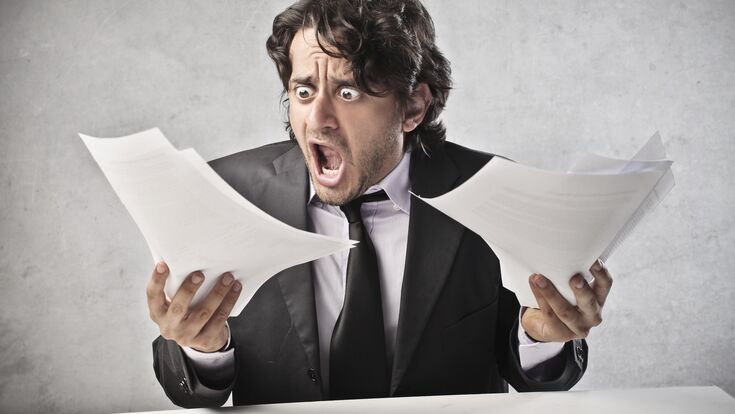 © Fotolia.de Honorar Designer Zettel Bürokratie Verwaltung