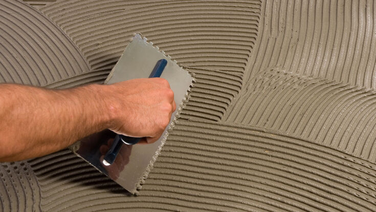© Chiran - stock.adobe.com construction adhesive tiles insulation cement architecture background block brick build close-up color create hand home irregular jigsaw laying material mortar old pattern plaster shape stone structure style wall