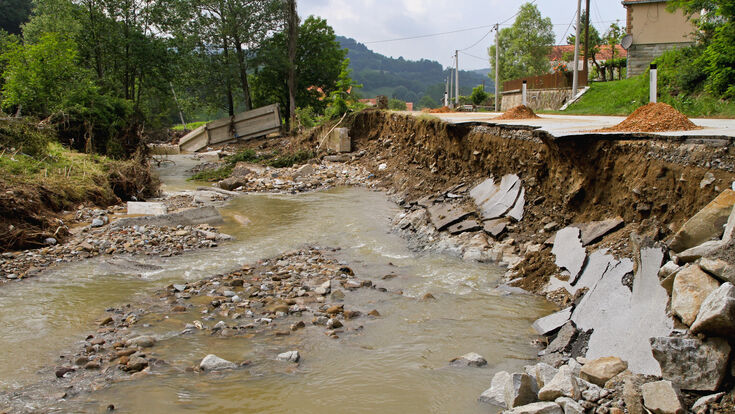 © markobe - stock.adobe.com flooding landslide disaster flood landslip erosion nature damage after destruction debris fllow river bridge concrete narrows road danger force risk safety ruined rural environment overflow environmental